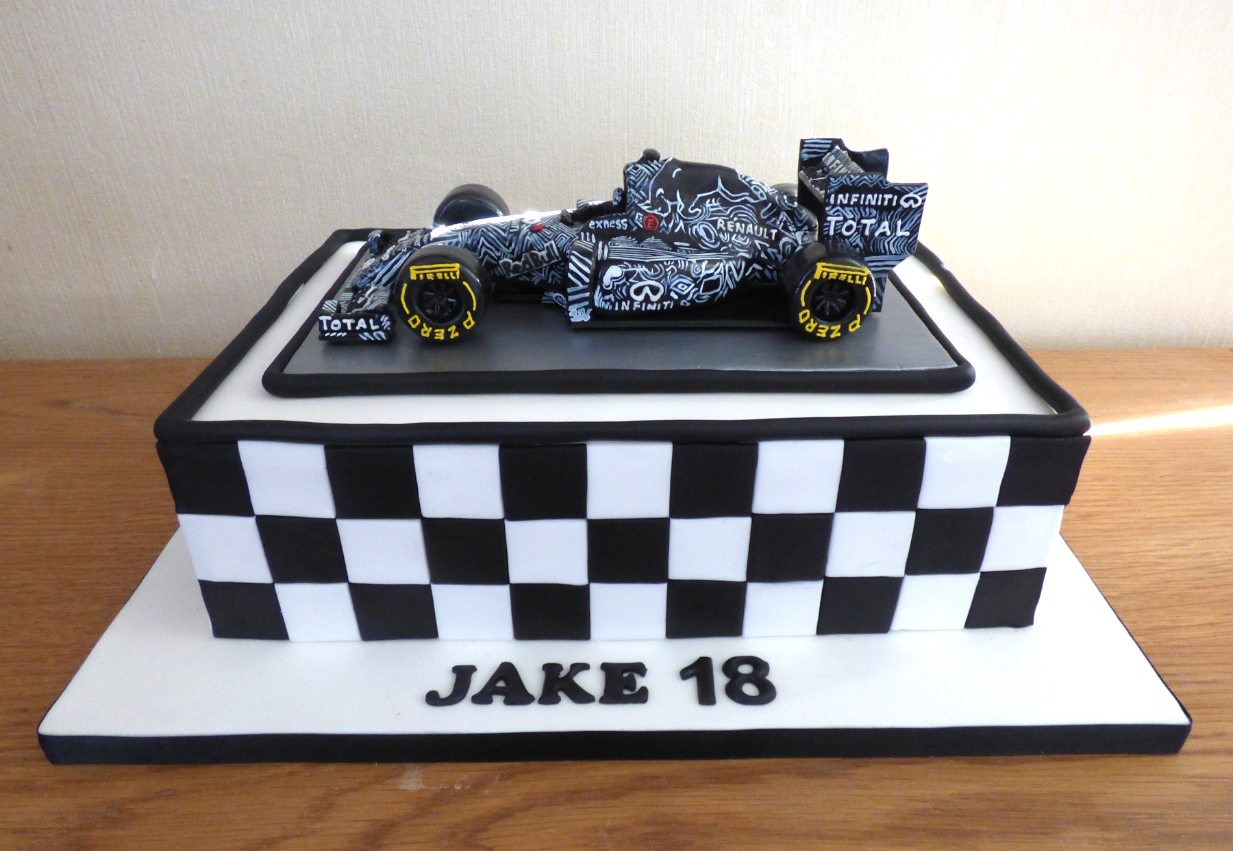 Verstappen's Red Bull F1 Camouflage Race Car Birthday Cake | Susie's Cakes